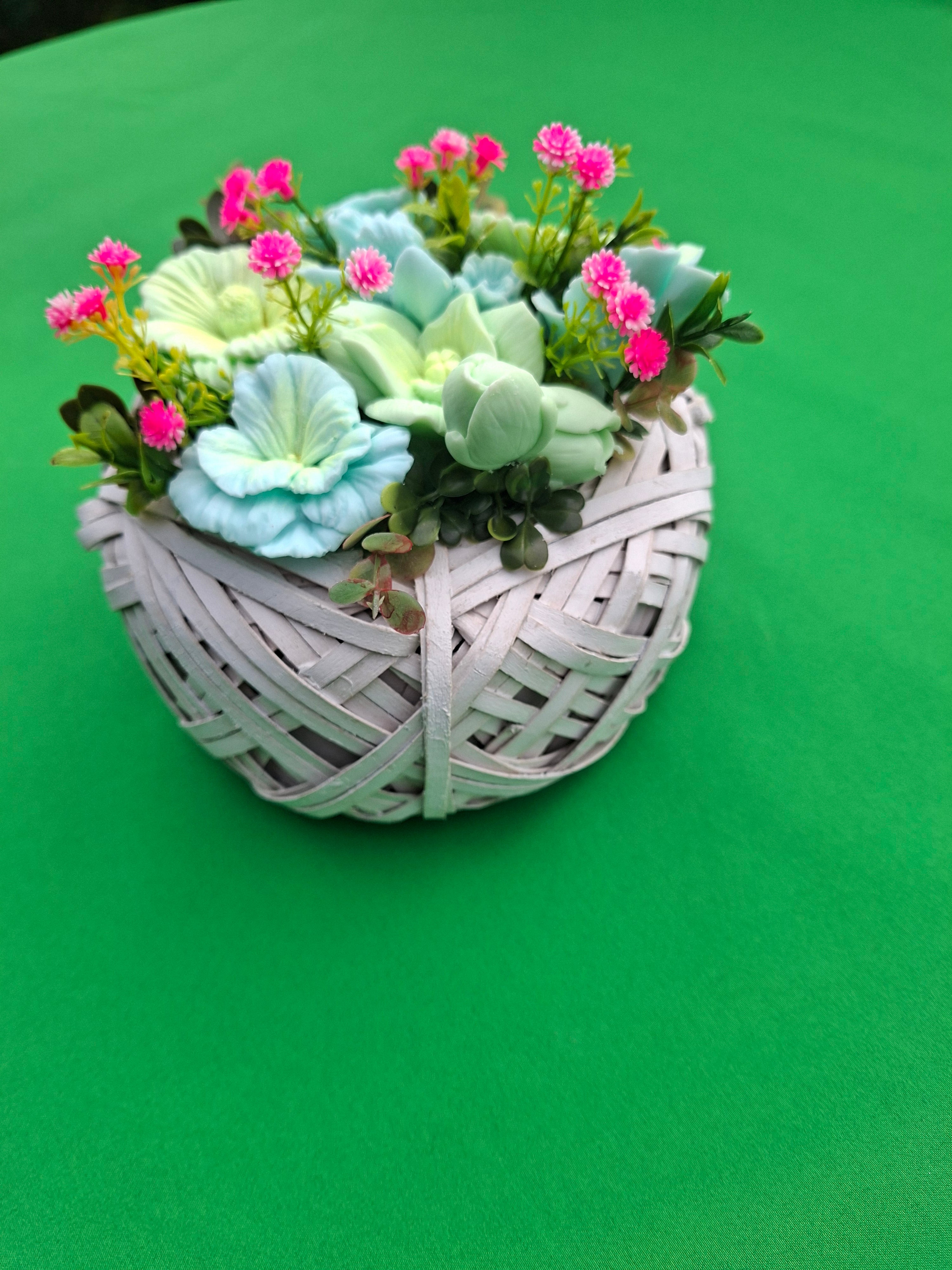 Artificial Floral Arrangement In Woven Basket With Green And Pink Blooms