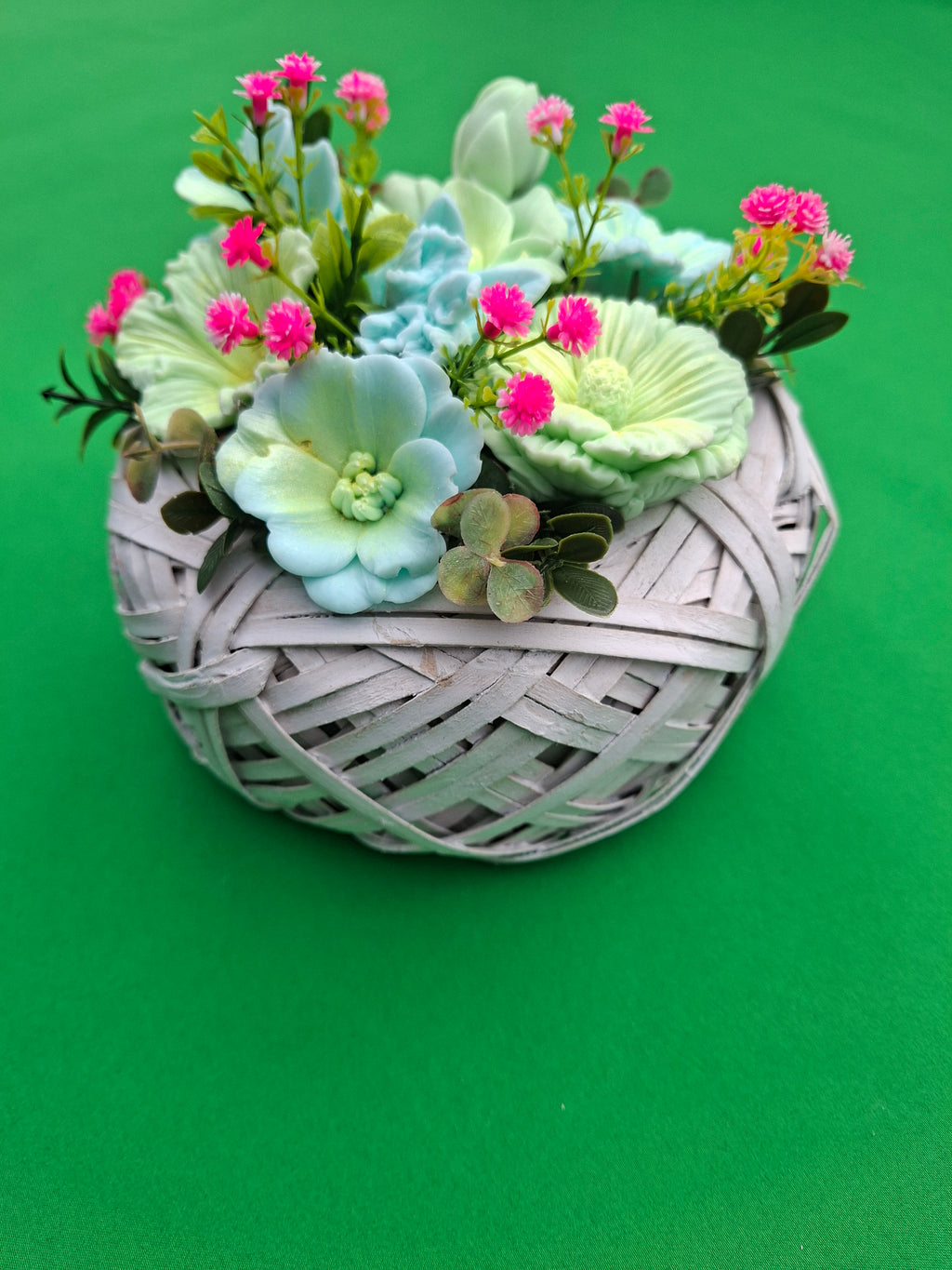Artificial Floral Arrangement In Woven Basket With Green And Pink Blooms