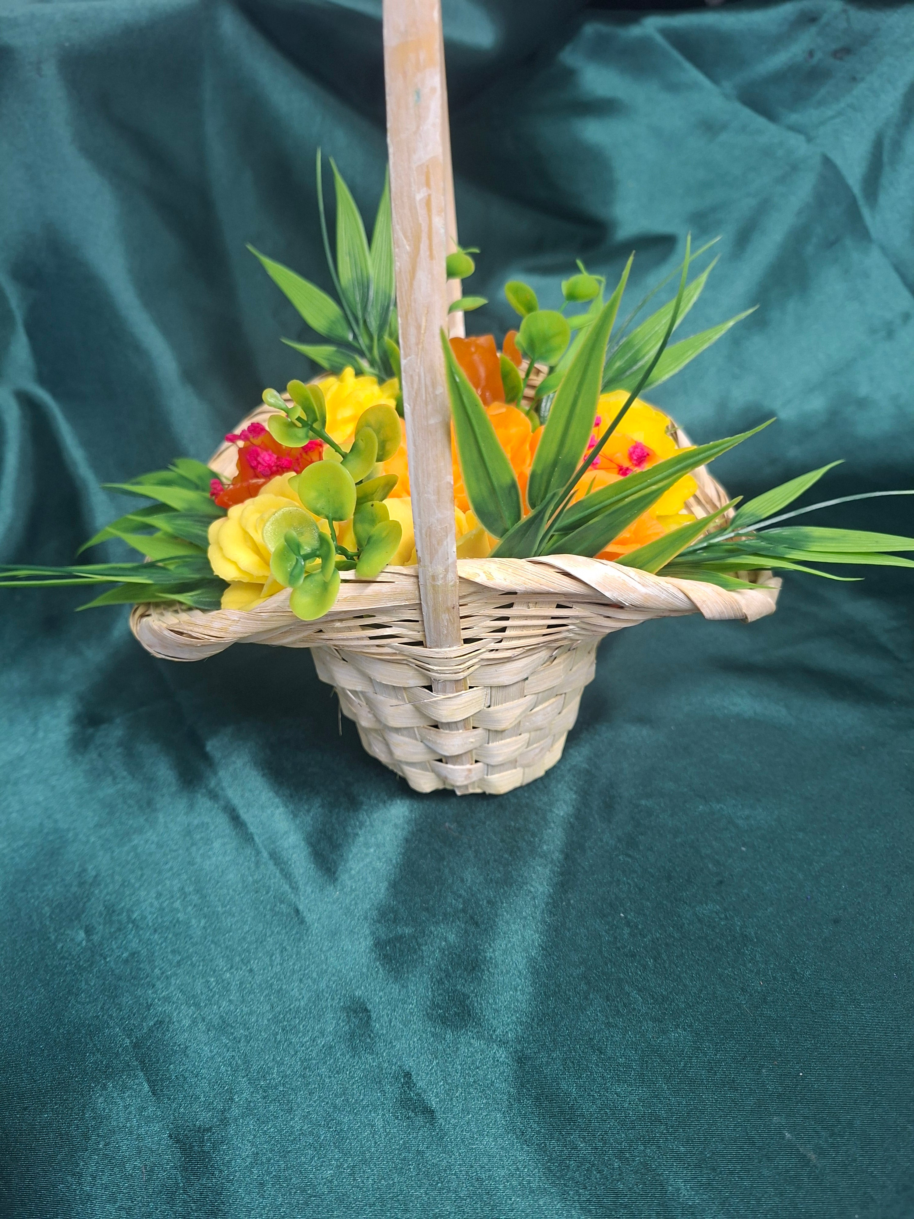 Woven Basket Floral Arrangement With Artificial Orange And Yellow Roses