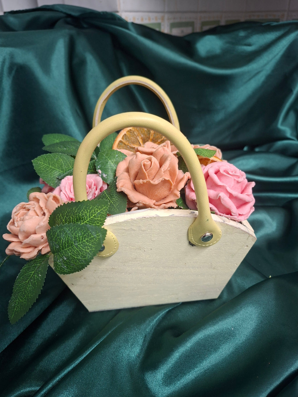 Woven Floral Basket With Pink Peach Artificial Roses And Green Leaves