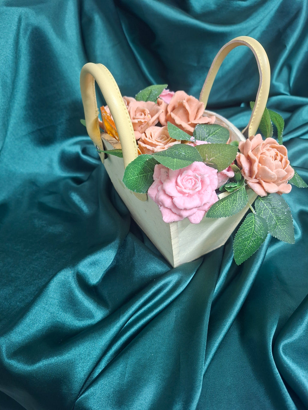 Woven Floral Basket With Pink Peach Artificial Roses And Green Leaves