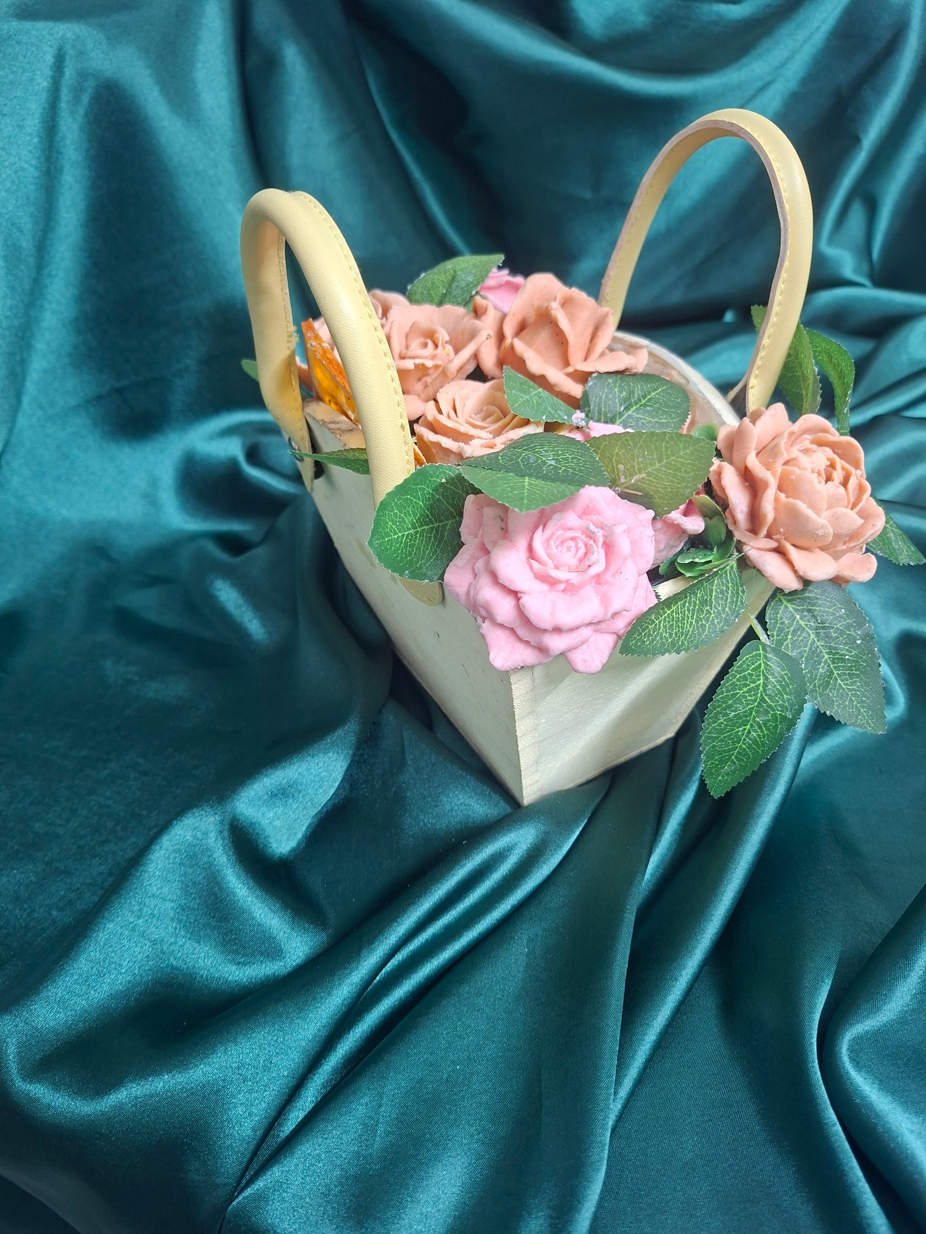 Woven Floral Basket With Pink Peach Artificial Roses And Green Leaves