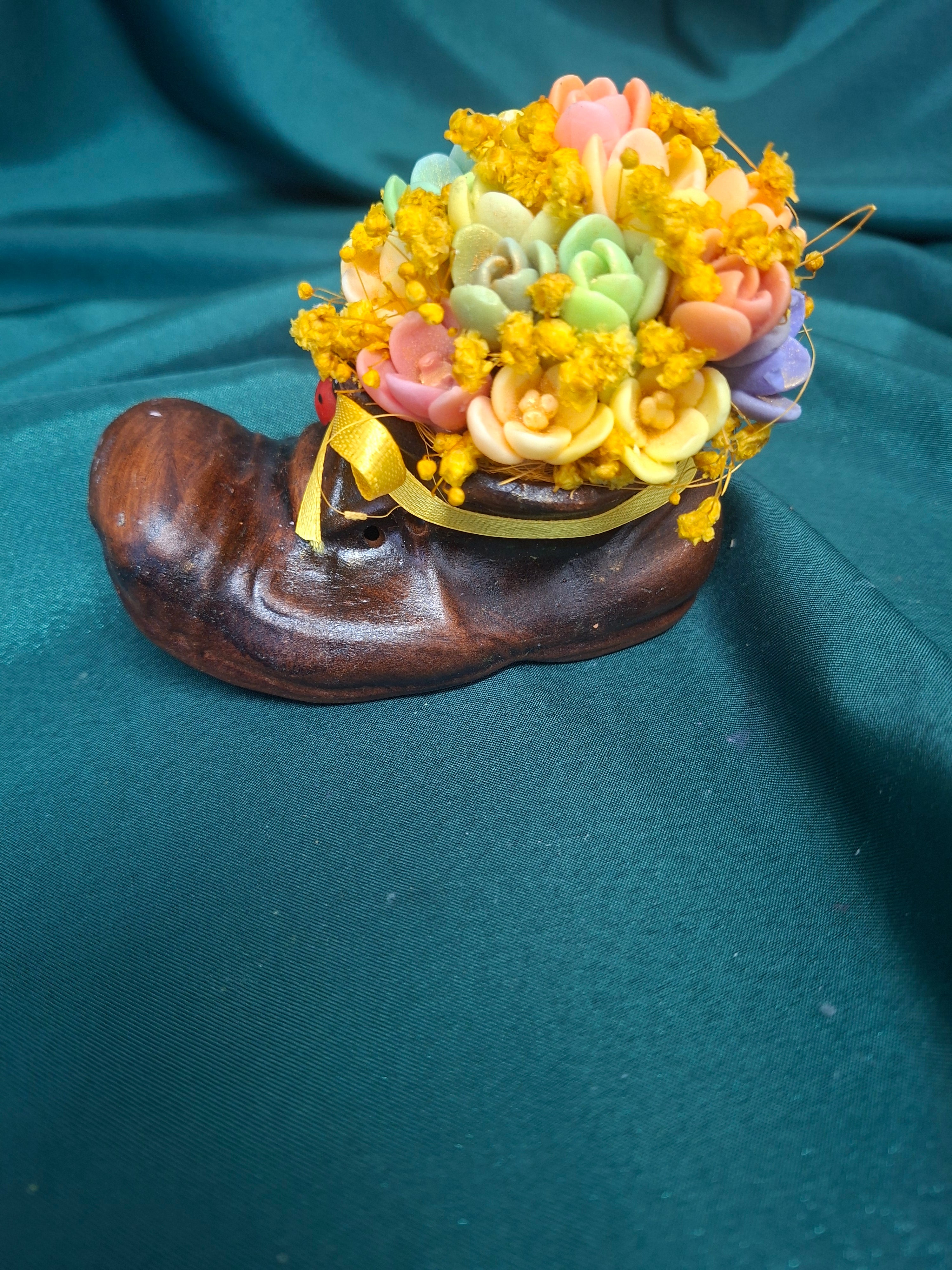 Artificial Flower Bouquet in Rustic Boot Vase with Yellow Ribbon