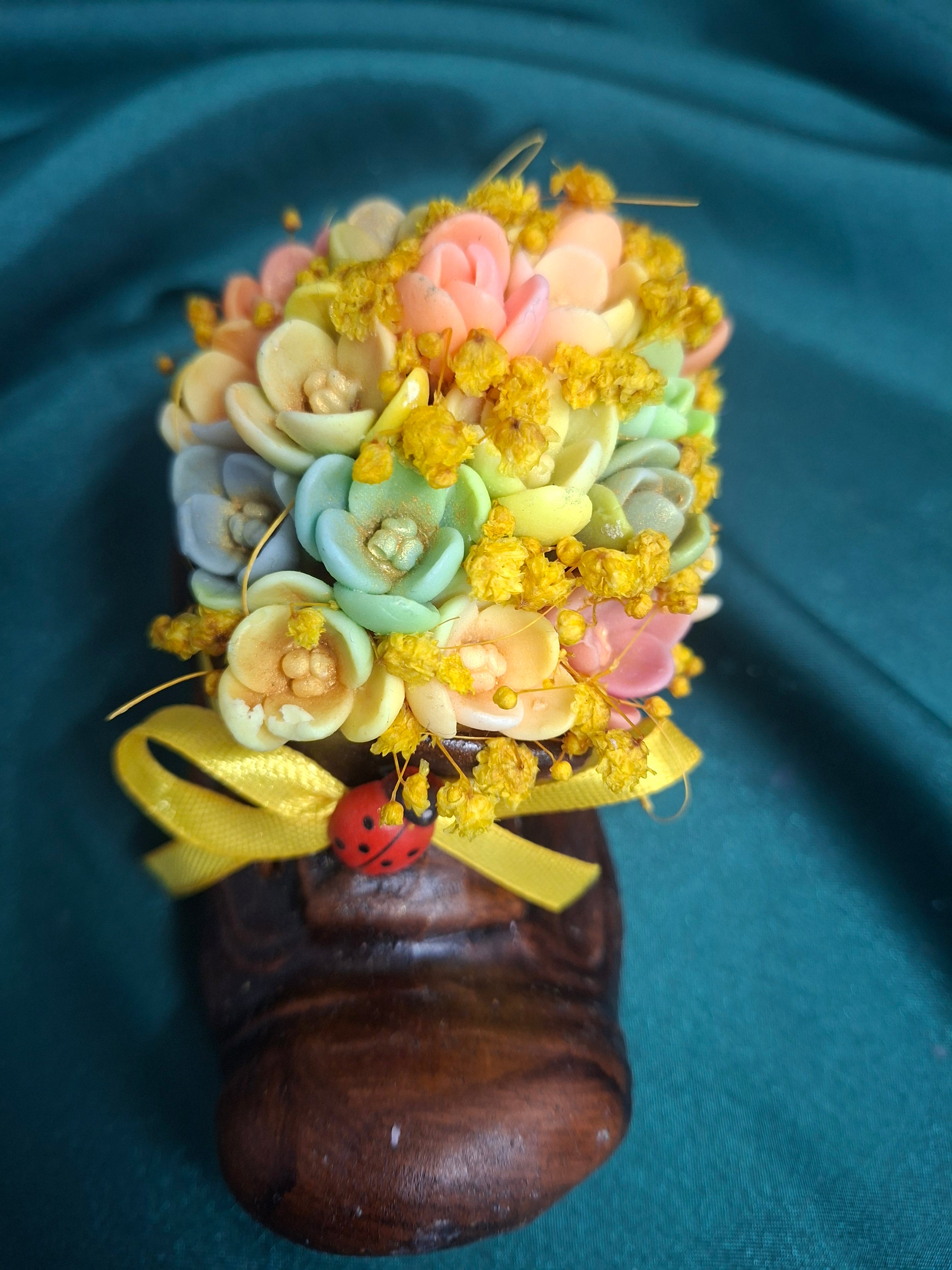 Artificial Flower Bouquet in Rustic Boot Vase with Yellow Ribbon