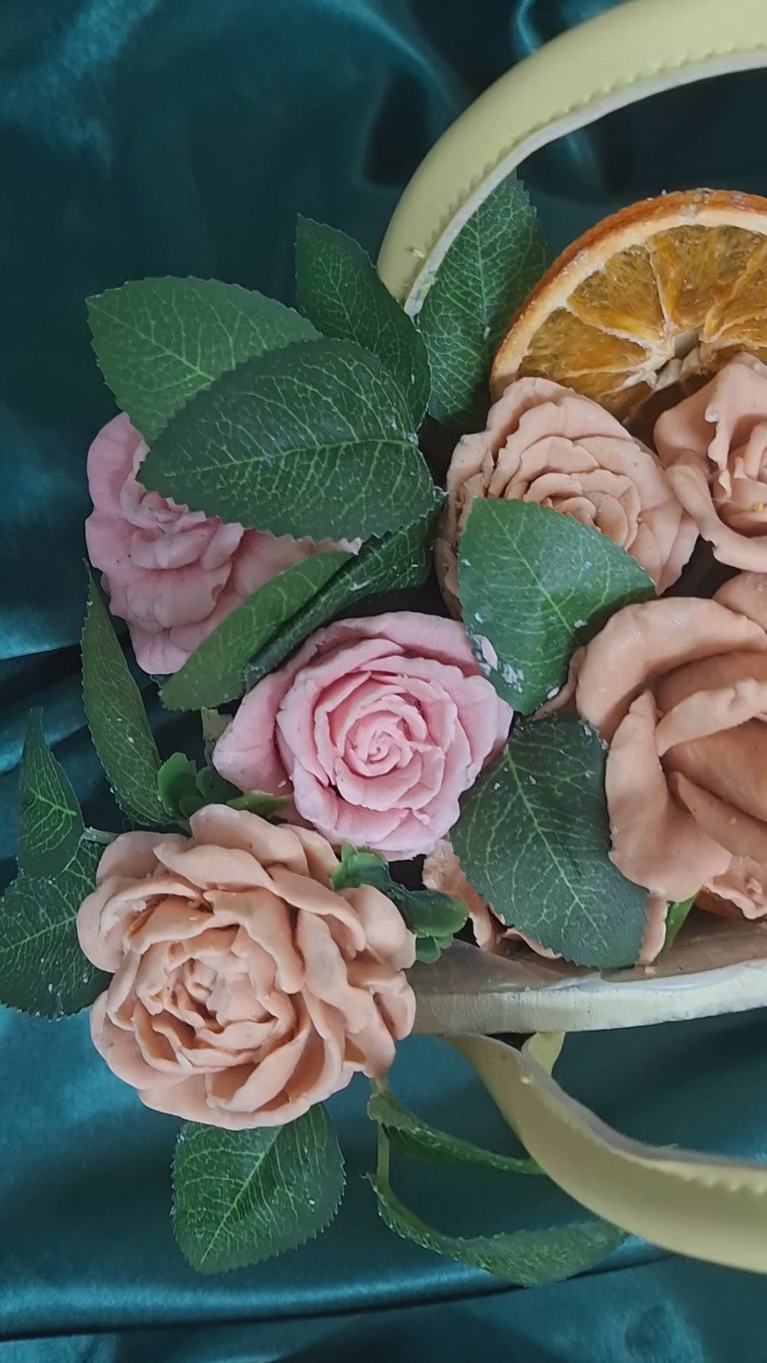 Woven Floral Basket With Pink Peach Artificial Roses And Green Leaves