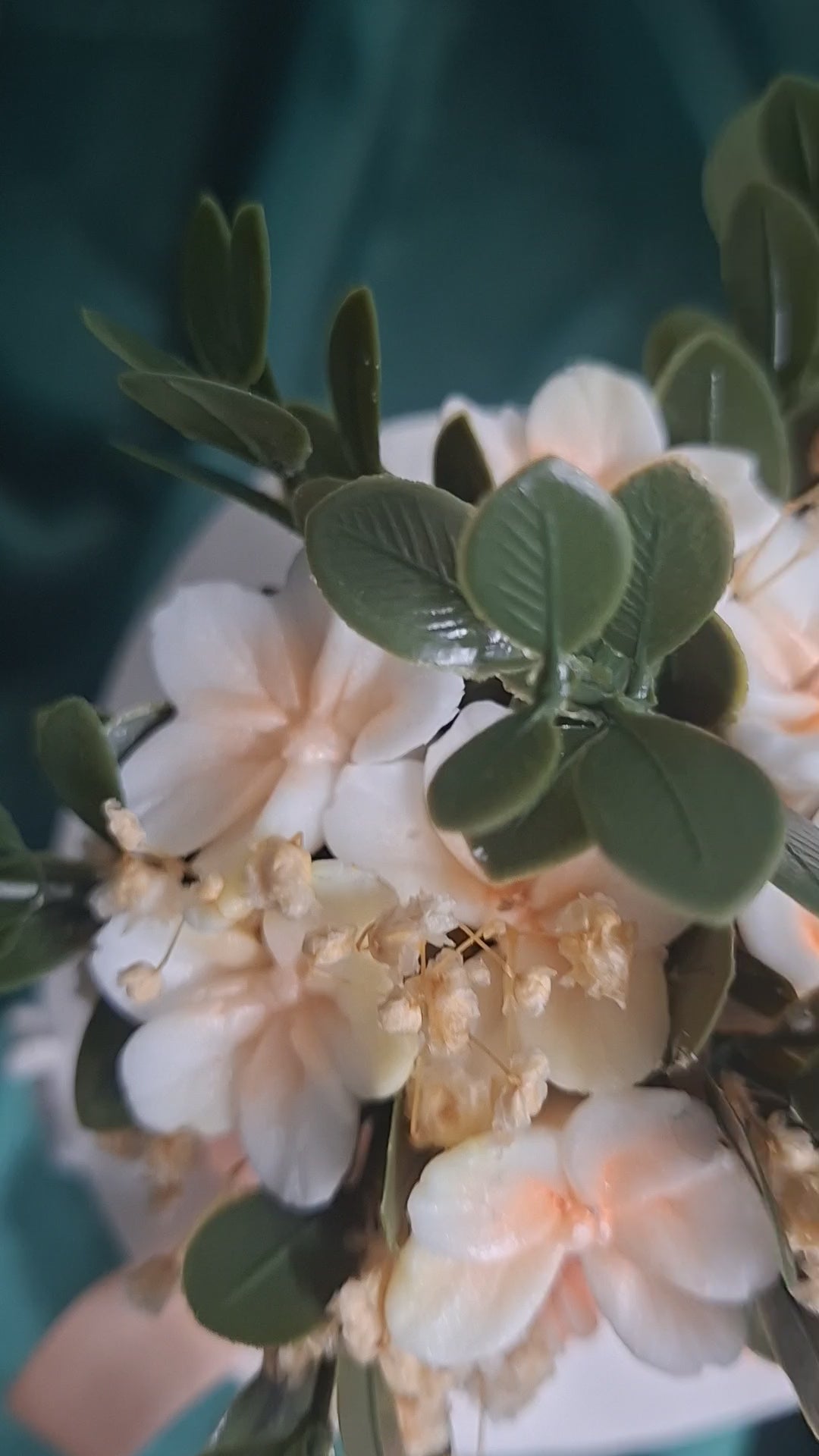 Elegant Artificial Floral Hat Display With Peach Ribbon Accent