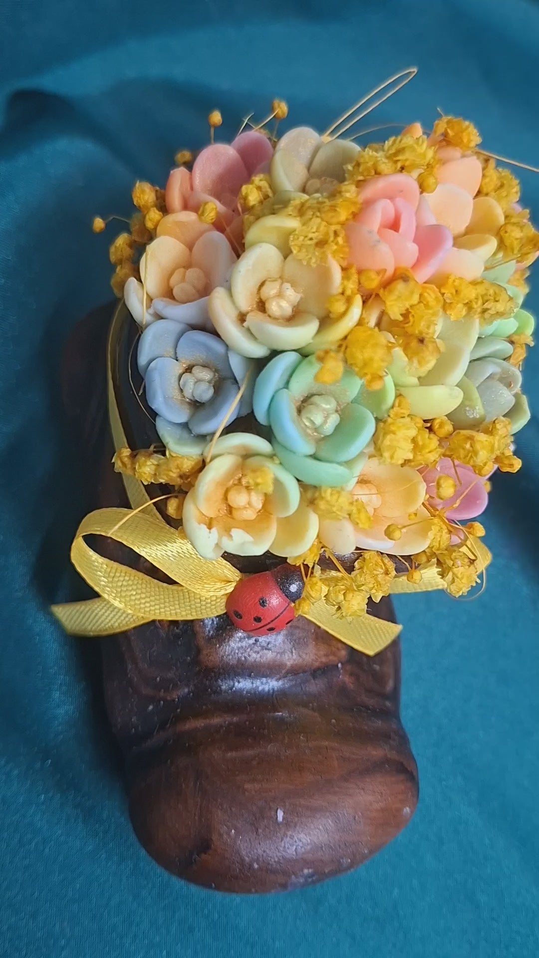Artificial Flower Bouquet in Rustic Boot Vase with Yellow Ribbon
