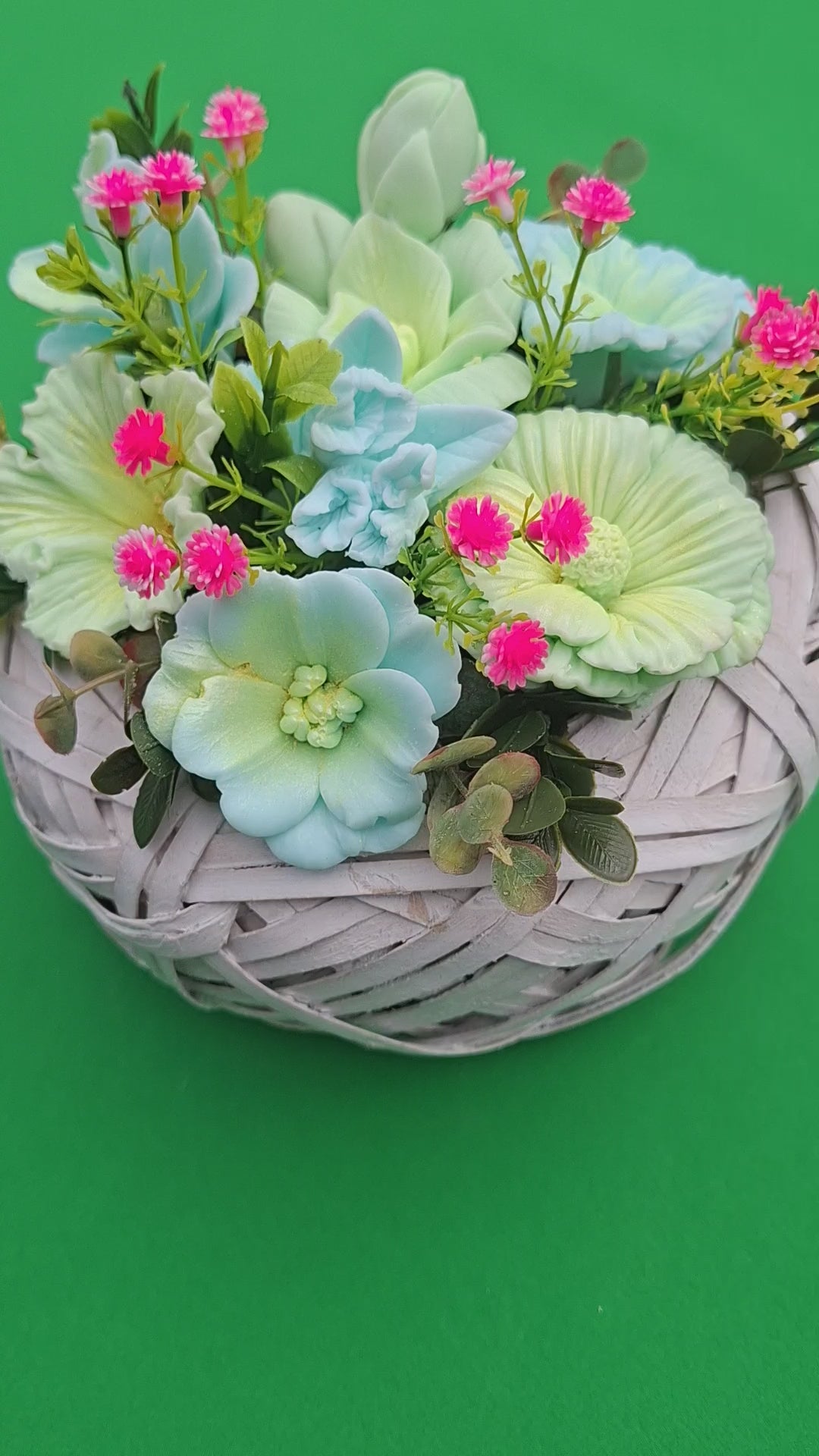 Artificial Floral Arrangement In Woven Basket With Green And Pink Blooms